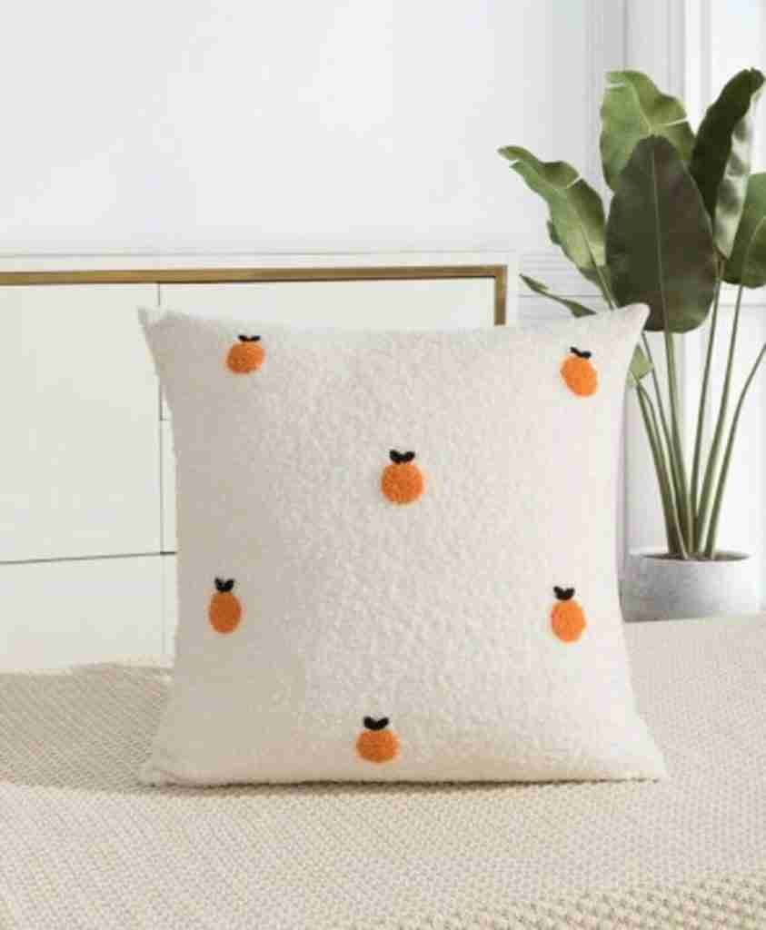 cushion with mini oranges