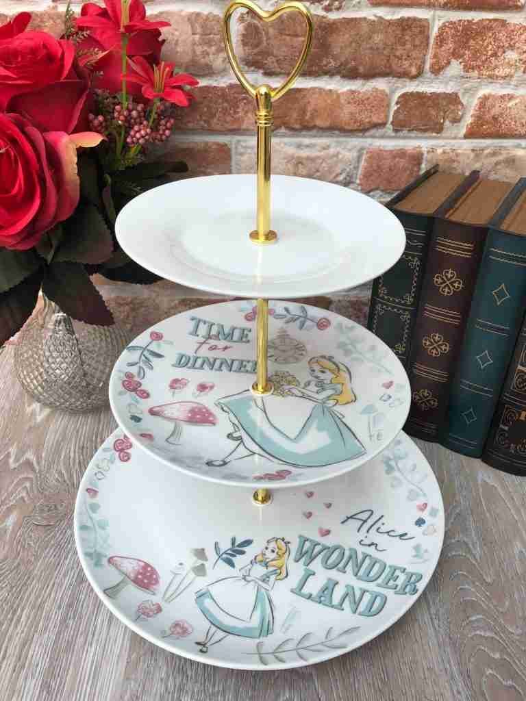 Alice in Wonderland 3 tier cake stand with illustrations.